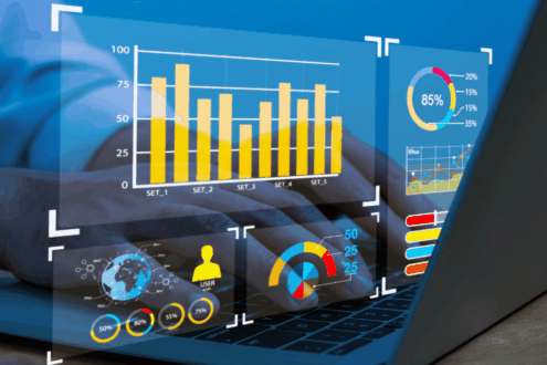 Dashboard als illustratives Element vor Laptop